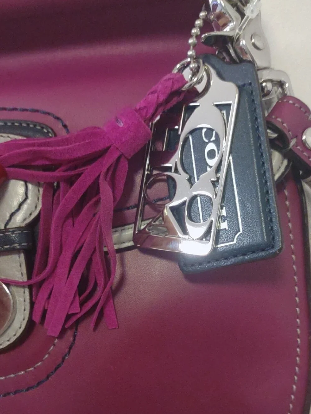 COACH Plum Leather Satchel with Contrast Trim and Tassel